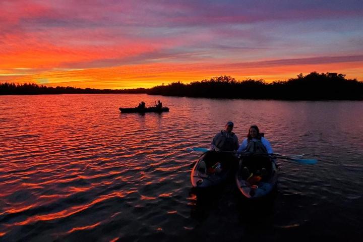 a sunset over a body of water