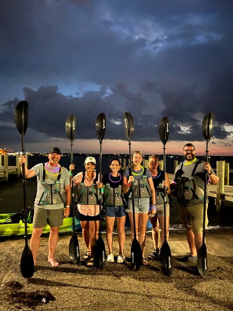 a group of people posing for the camera